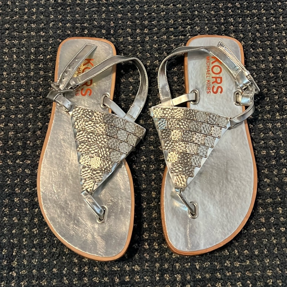 Micheal Kors silver flats Size 7 in very good condition